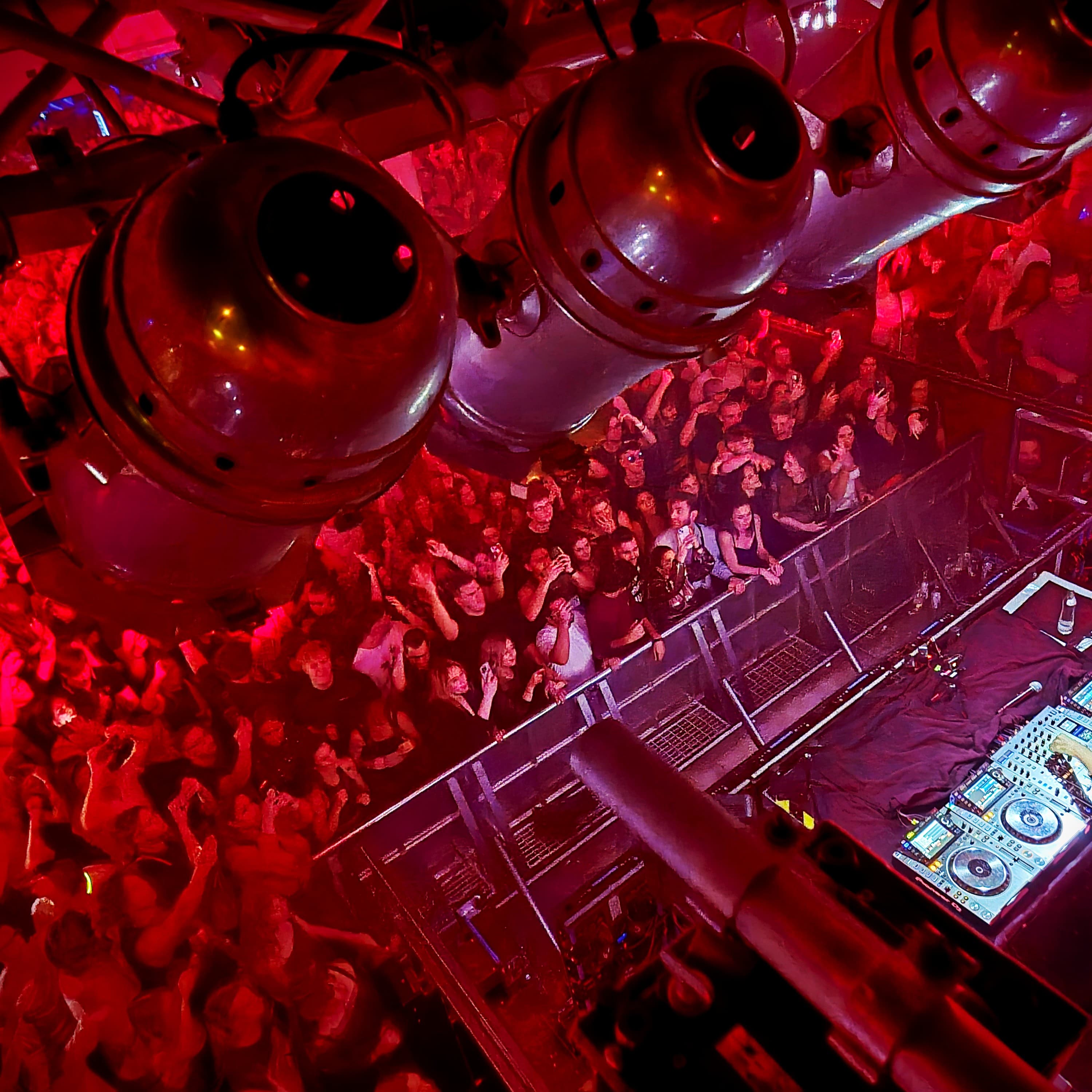 Danced All Night cover artwork showing a red-lit club crowd from above the DJ booth.