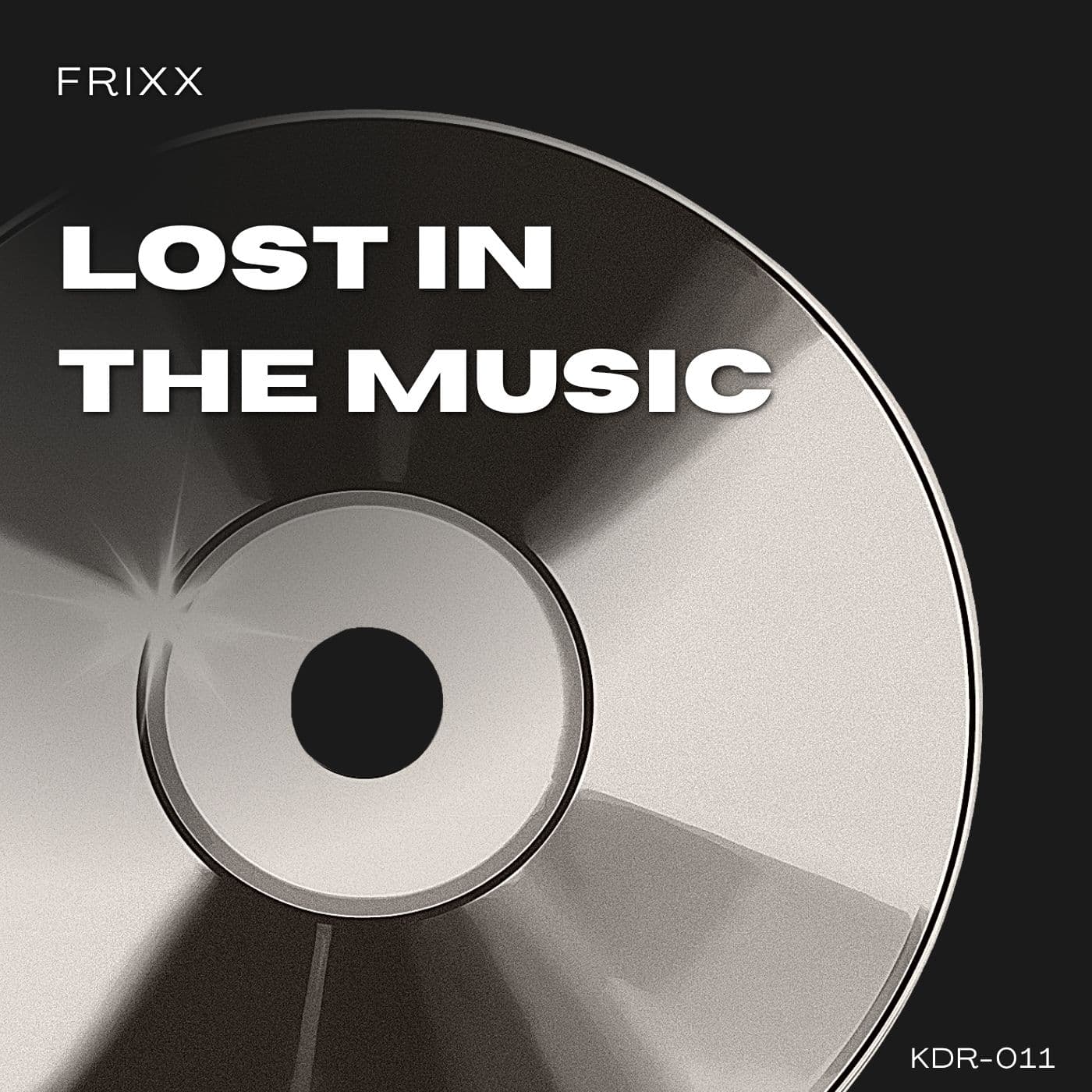Lost In The Music cover artwork featuring a monochrome compact disc with the title in bold white typography and the catalogue number KDR-011.