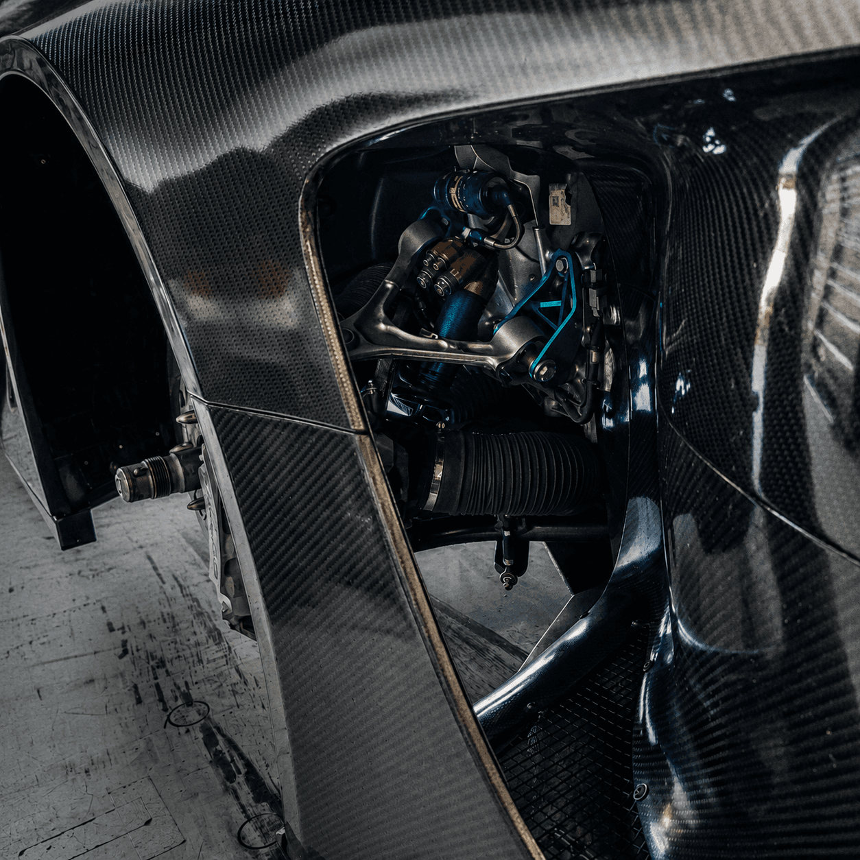 Overdrive cover artwork showing carbon-fibre bodywork and exposed suspension components.